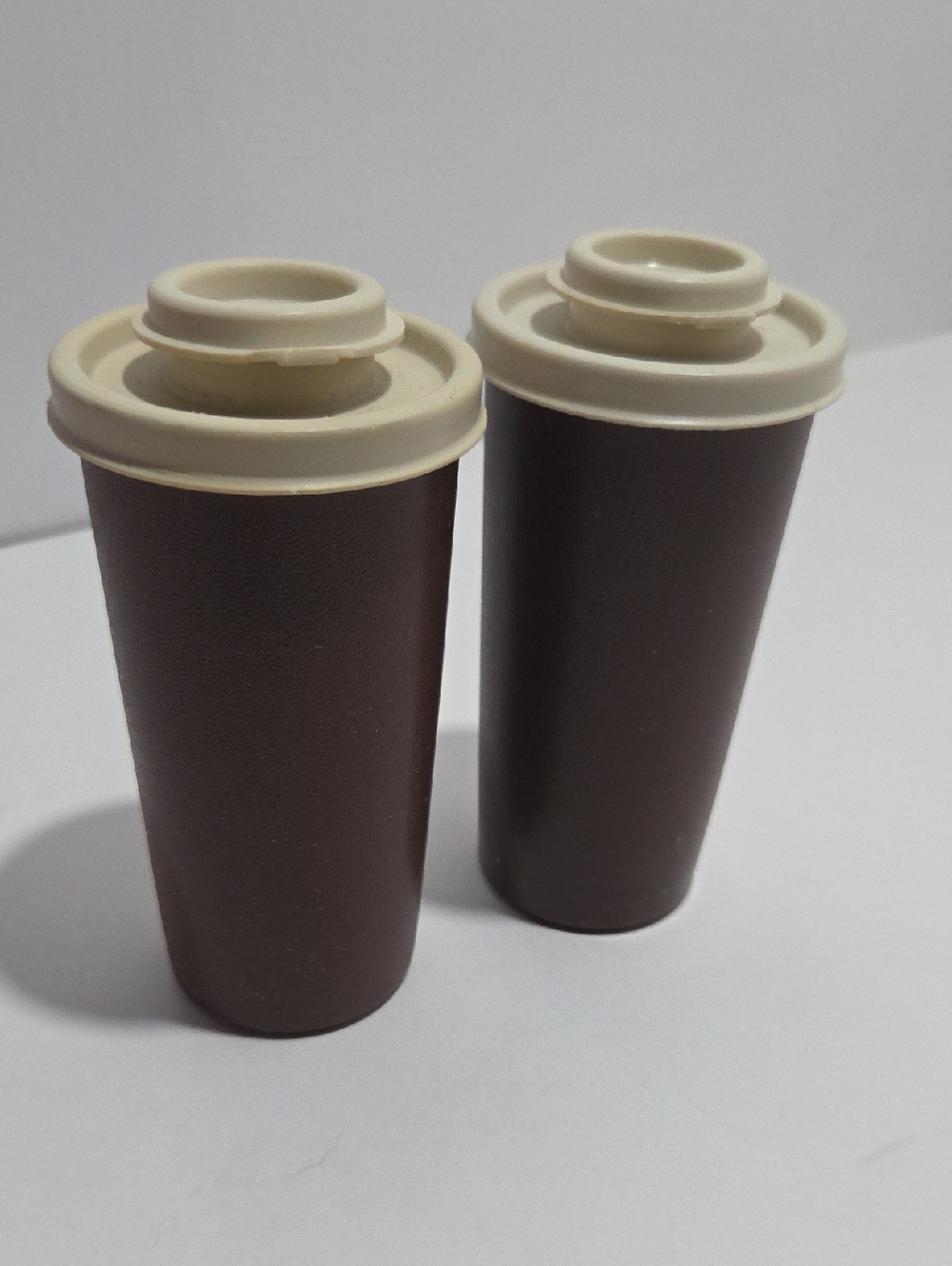 Brown and Tan Tupperware Shakers